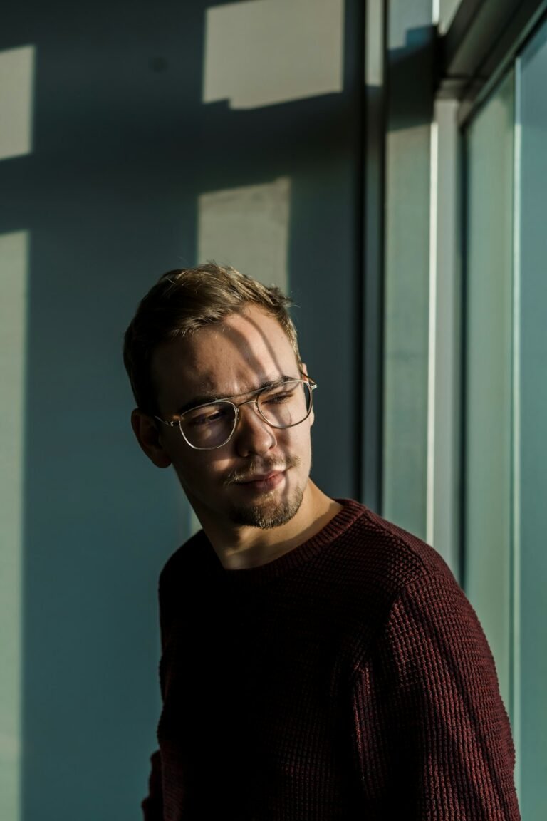 Man wearing eyeglasses in a lifestyle portrait